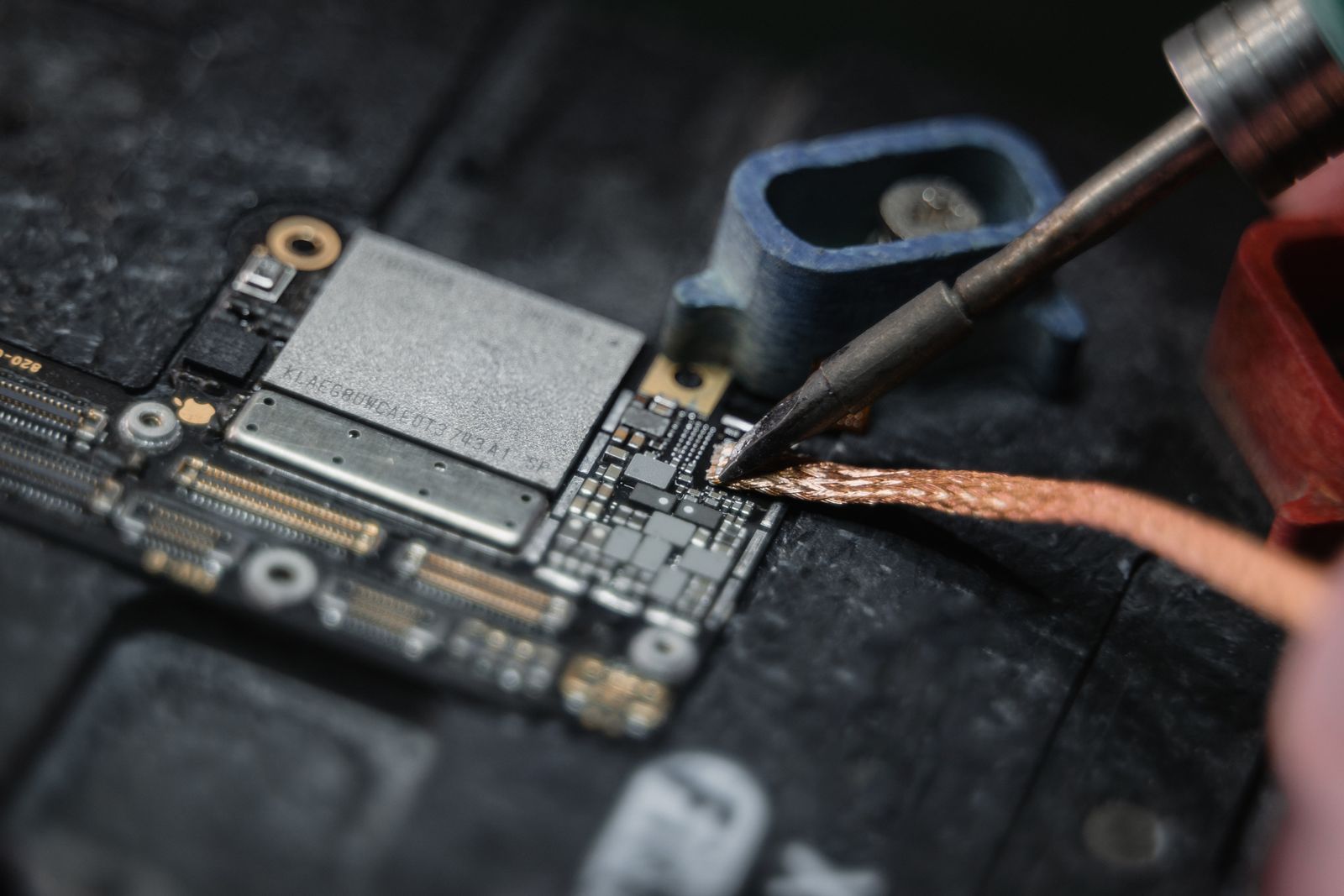 Close-up of soldering work on an electronic circuit board
